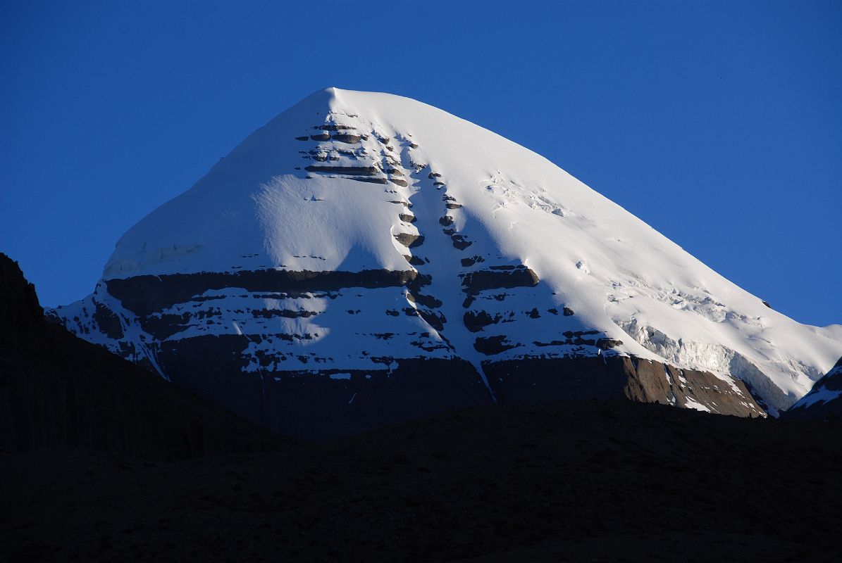 01 Mount Kailash South Face Close Up From Selung Gompa At Start Of Mount Kailash Inner Kora Nandi Parikrama After a 30-minute drive in our LandCruiser from Darchen, we arrive at the end of the 4WD road below Seleng Gompa at 06:45 (4991m). We could see the top part of the Mount Kailash South Face shining in the early morning sun above the intervening ridge.